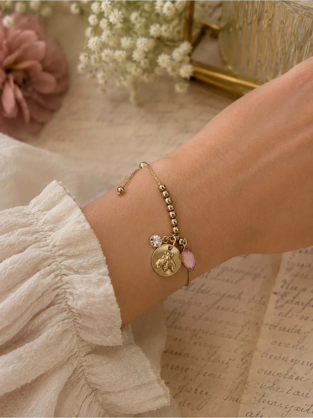 Vintage Gold Toned Bee Charm Bracelet with Pink Crystal Accent